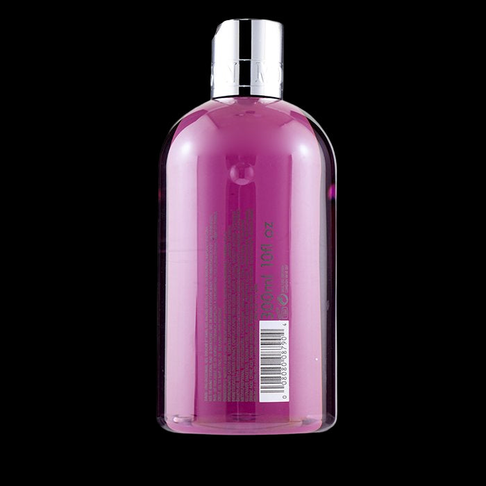 Pink bottle with a silver cap on a white background
