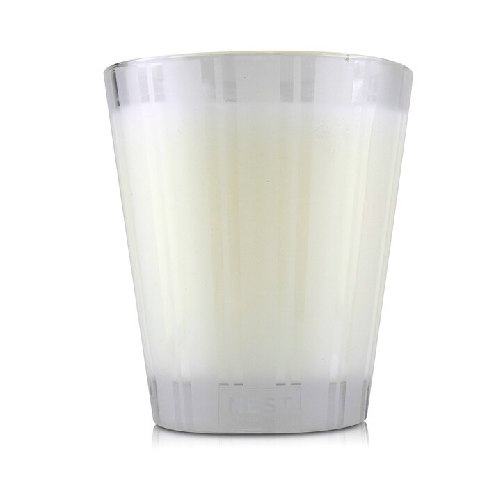 White textured candle on a white background