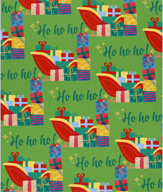 Christmas-themed wrapping paper with presents and reindeer on a green background