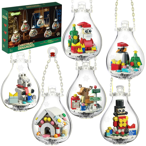 Set of Christmas-themed LEGO ornaments in clear bulb-shaped containers with a box in the background.