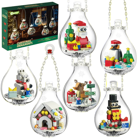 Set of Christmas-themed LEGO ornaments in clear bulb-shaped containers with a box in the background.