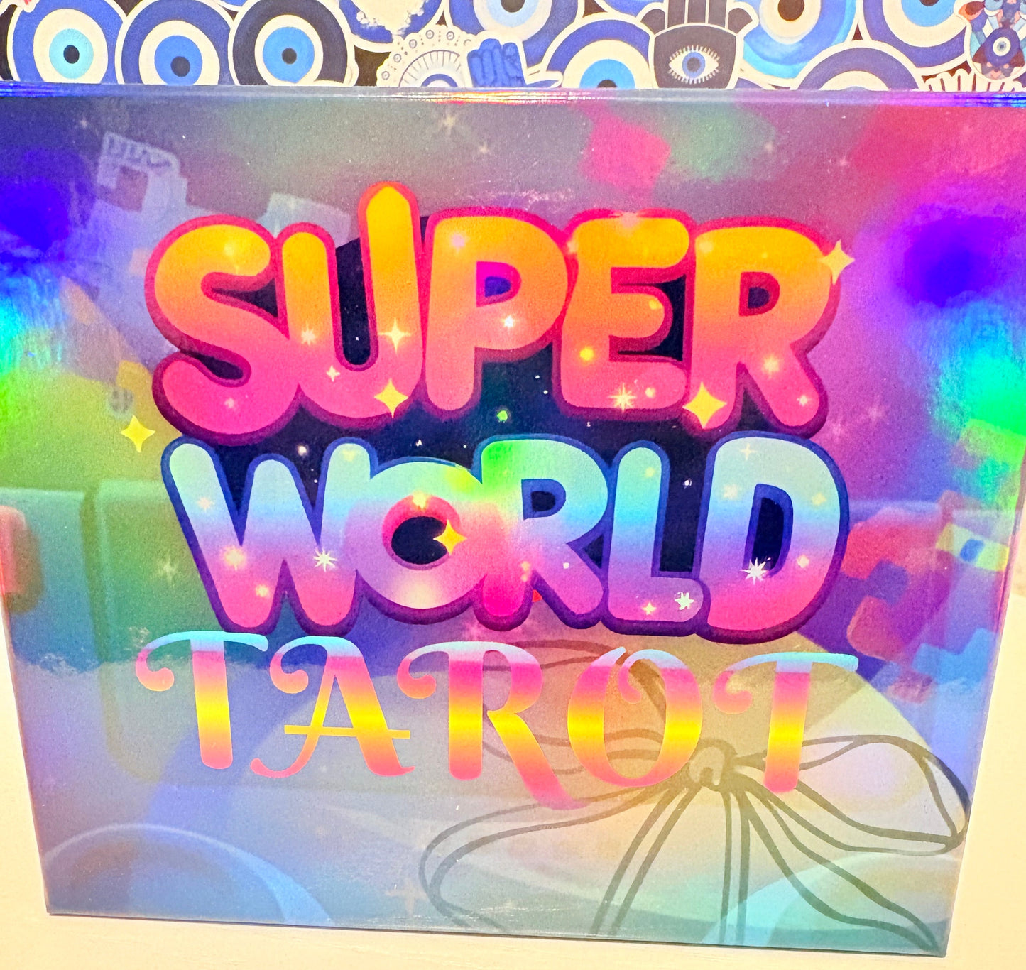 Colorful packaging with 'Super World LARQ' text on a patterned background