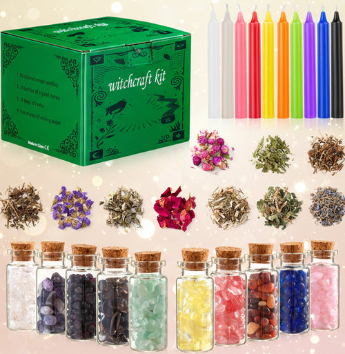 Witchcraft kit with candles, herbs, and colored stones on a white background
