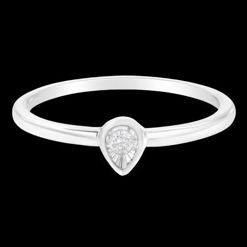 Silver ring with a teardrop-shaped diamond on a white background