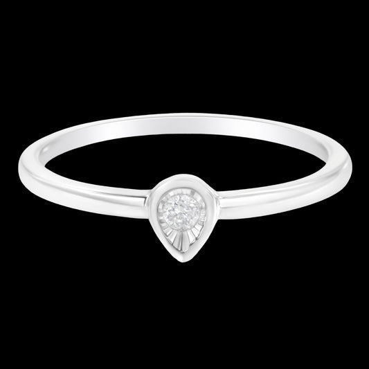 Silver ring with a teardrop-shaped diamond on a white background