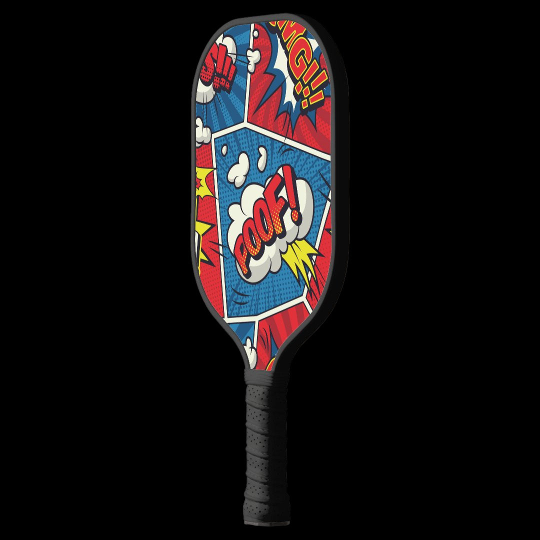 Pickleball paddle with comic book-style design on a white background