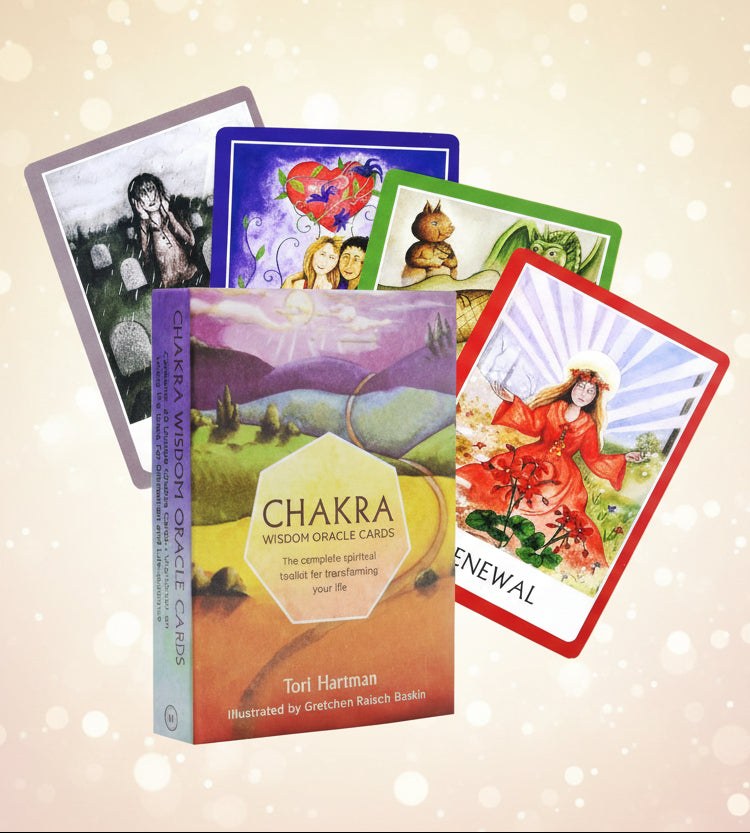 Chakra Wisdom Oracle Cards with colorful cards and box on a white background