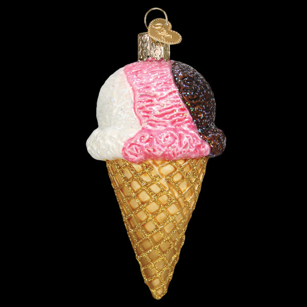 Decorative ice cream cone ornament with pink and white swirls on a white background