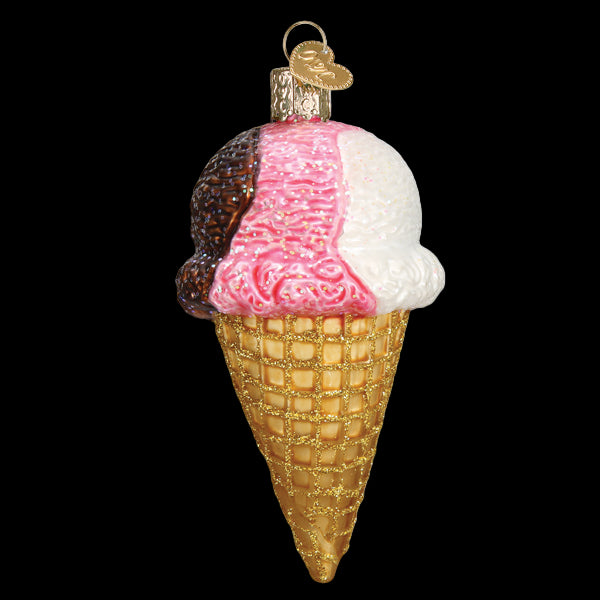 Decorative ice cream cone ornament with pink, white, and chocolate scoops on a white background