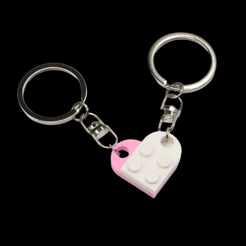 Keychain with heart-shaped design on a green background