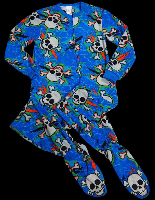 Children's onesie with skull and crossbones pattern on a blue background