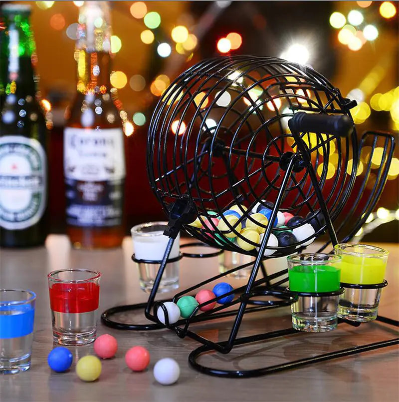 Lucky ball game with shot glasses and bottles in a festive setting