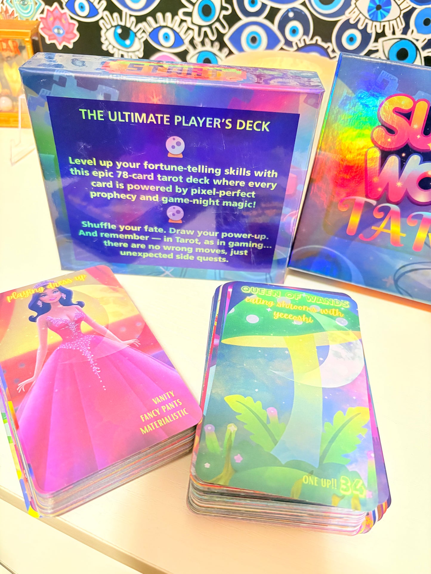 Colorful tarot cards with various designs on a patterned surface