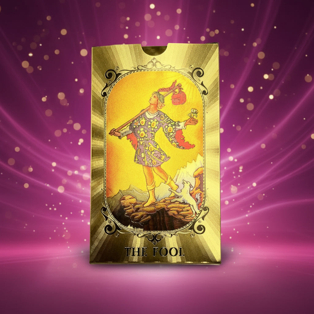 Card featuring 'The Fool' from a tarot deck with gold border on a light gray background