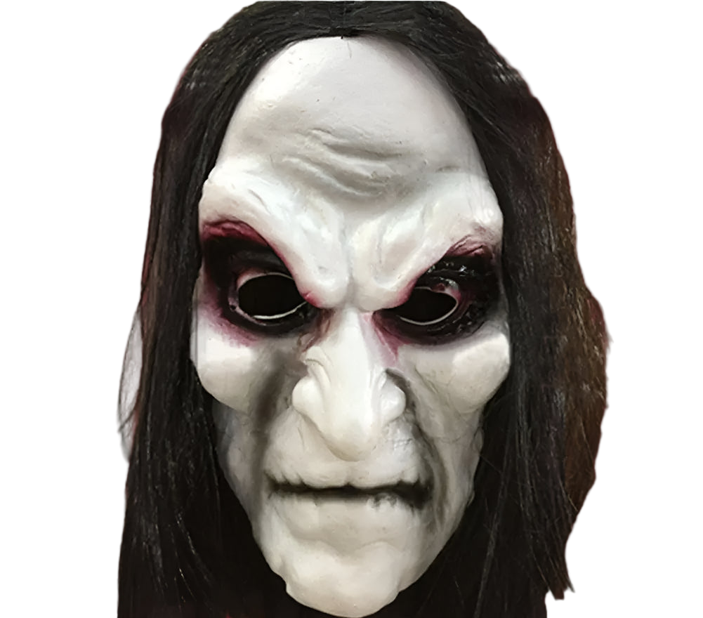 Horror-themed mask with dark hair against a wooden background