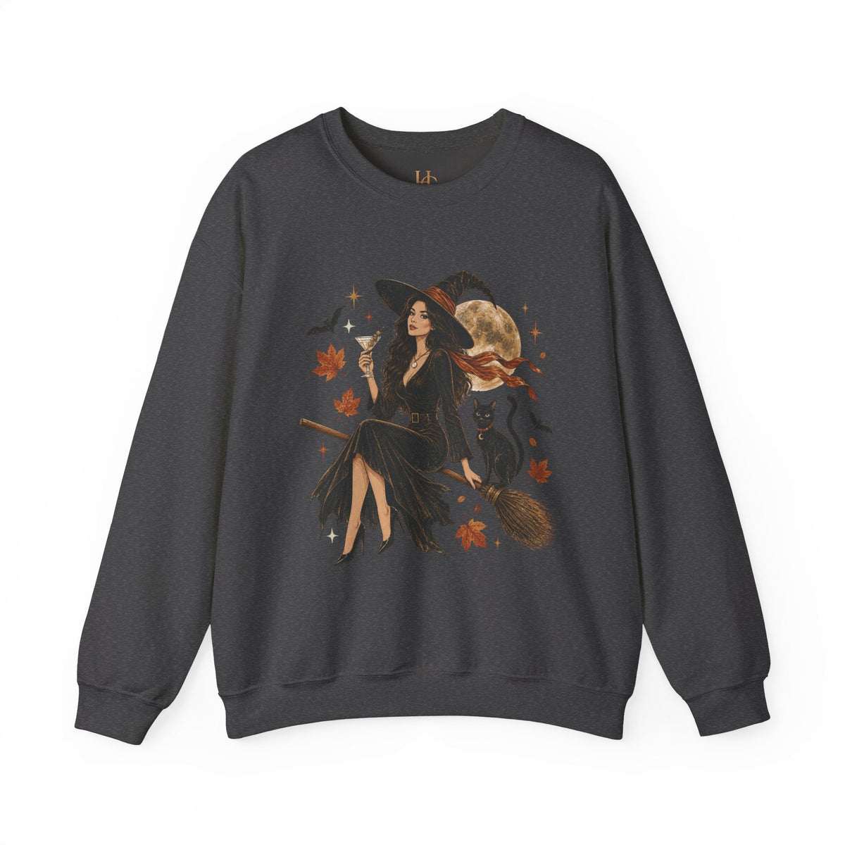 A dark gray crewneck sweatshirt featuring a detailed graphic of a witch sitting on a broomstick with a cat, surrounded by autumn leaves and a full moon.