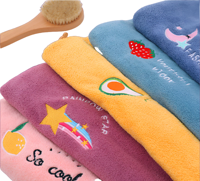 Set of colorful towels with cartoon designs on a white background