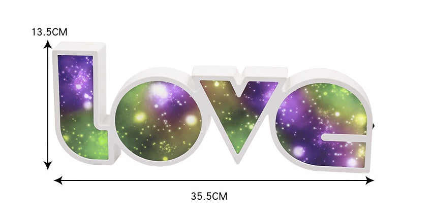 Decorative letters spelling 'LOVE' with galaxy design, shown with measurements on a white background.