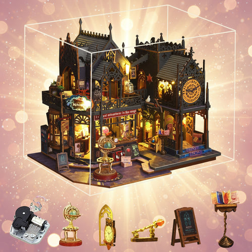 Detailed model of a gothic-style building with various accessories in front, all enclosed in a clear display case.