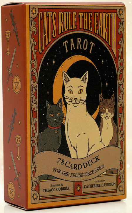 Tarot card deck packaging with cats and tarot symbols on an orange background