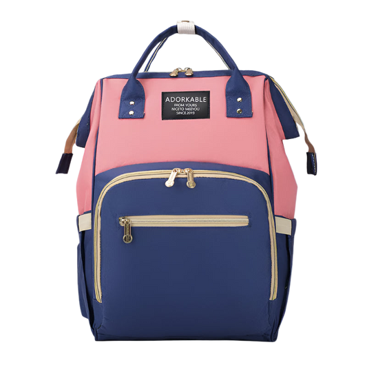 Pink and blue backpack with 'Adorkable' brand label on a white background