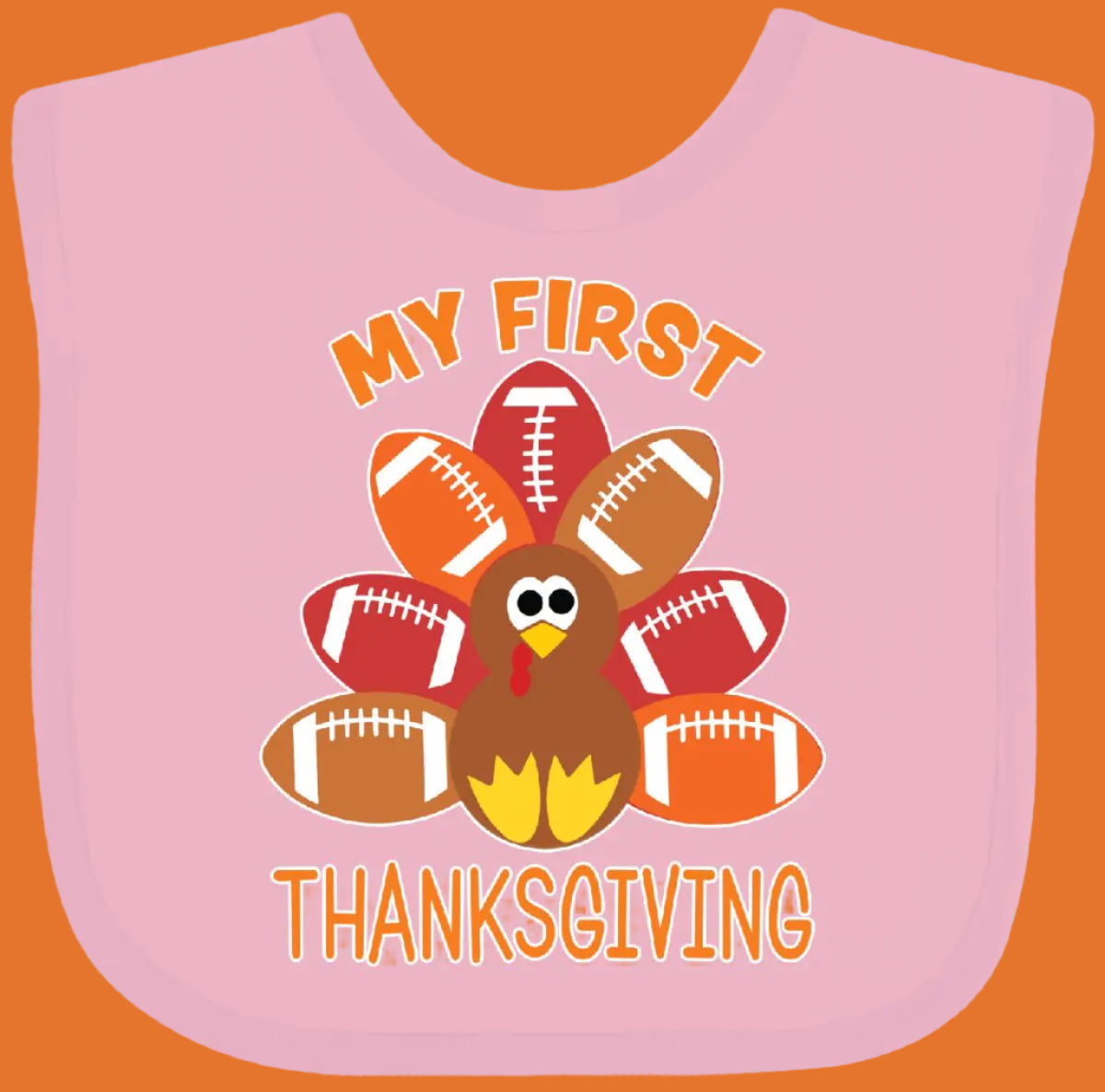 Pink bib with a turkey graphic and 'My First Thanksgiving' text on a white background