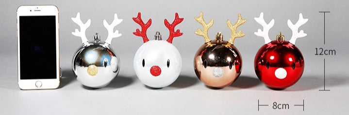 Four Christmas-themed ornaments with antlers, a phone for scale, and measurements on a gray background.