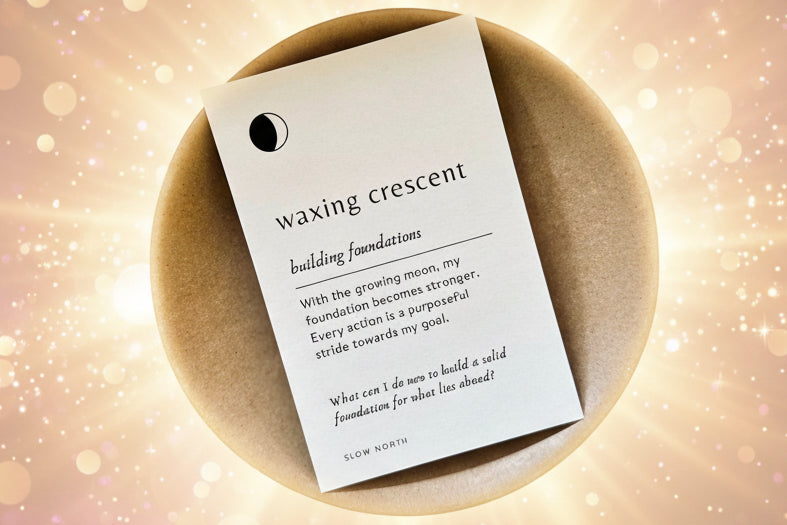 Card with text on a wooden surface