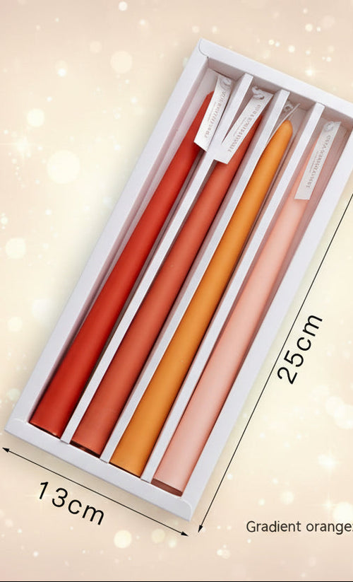 Set of gradient orange chopsticks in a box with measurements on a light background