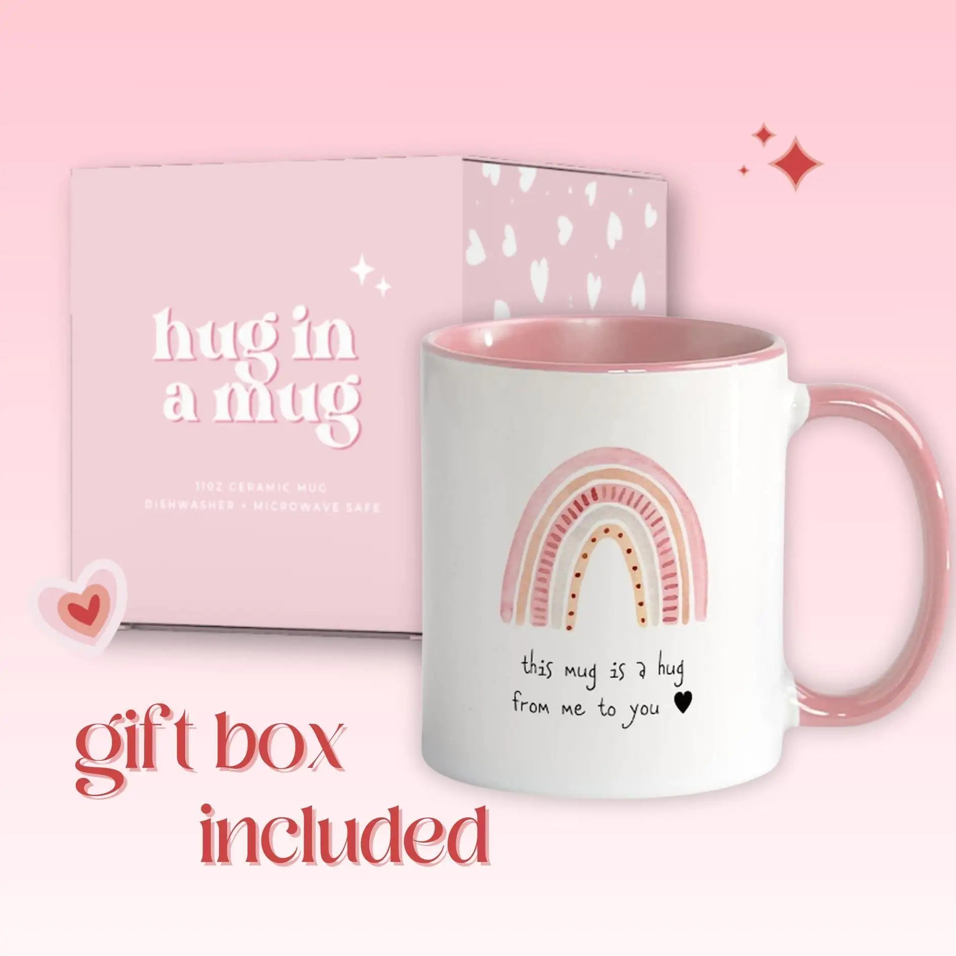 White mug with pink interior and rainbow design, accompanied by a matching gift box on a pink background.