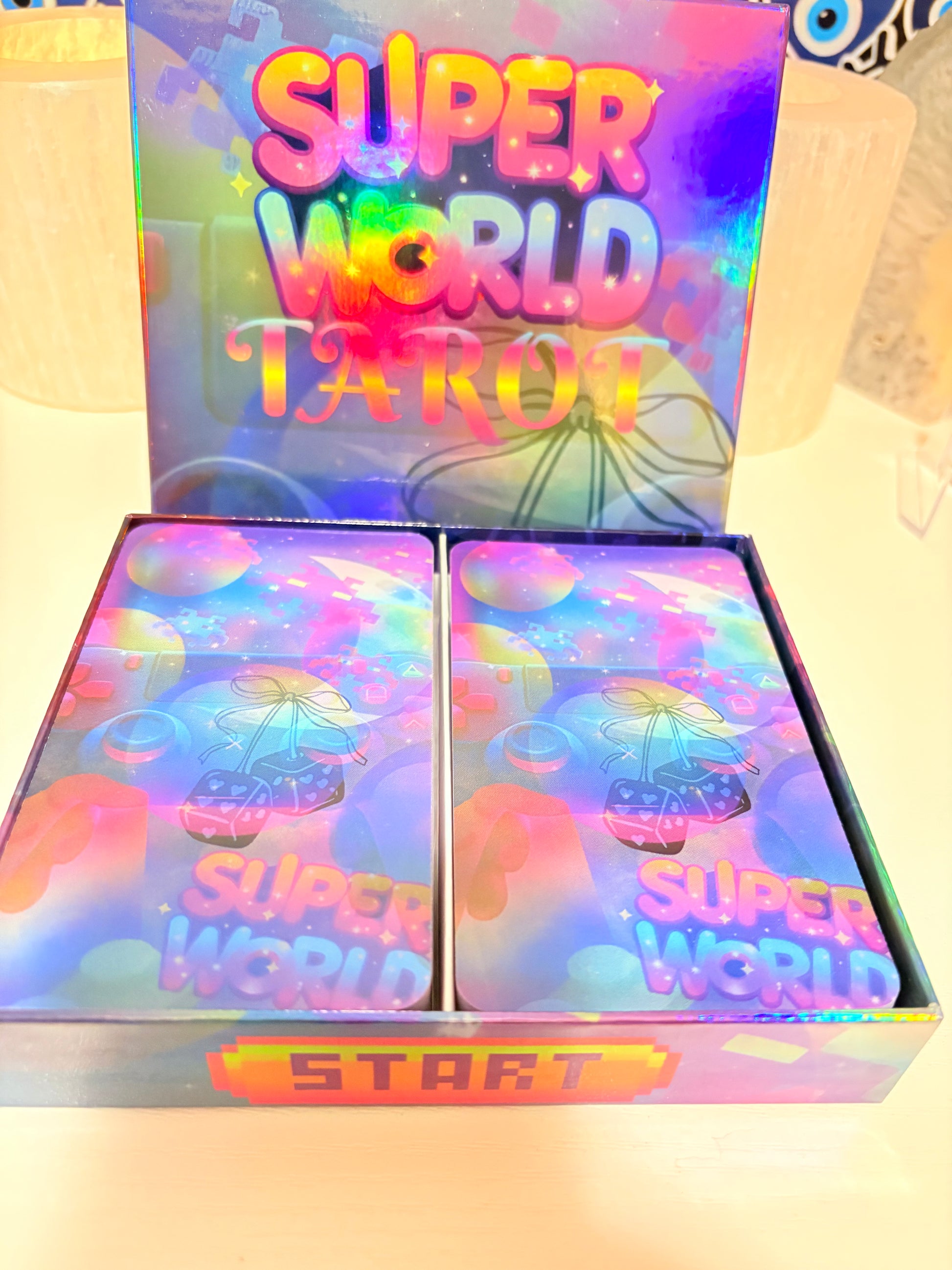 Colorful packaging with 'Super World Tour' text on a white background