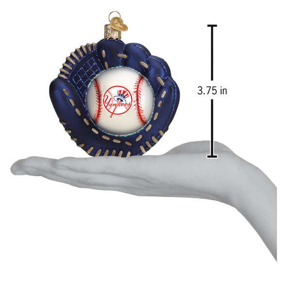 Decorative baseball glove ornament with a baseball inside, shown on a hand for scale.