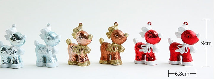 Set of small animal figurines in various colors on a white background with measurements.