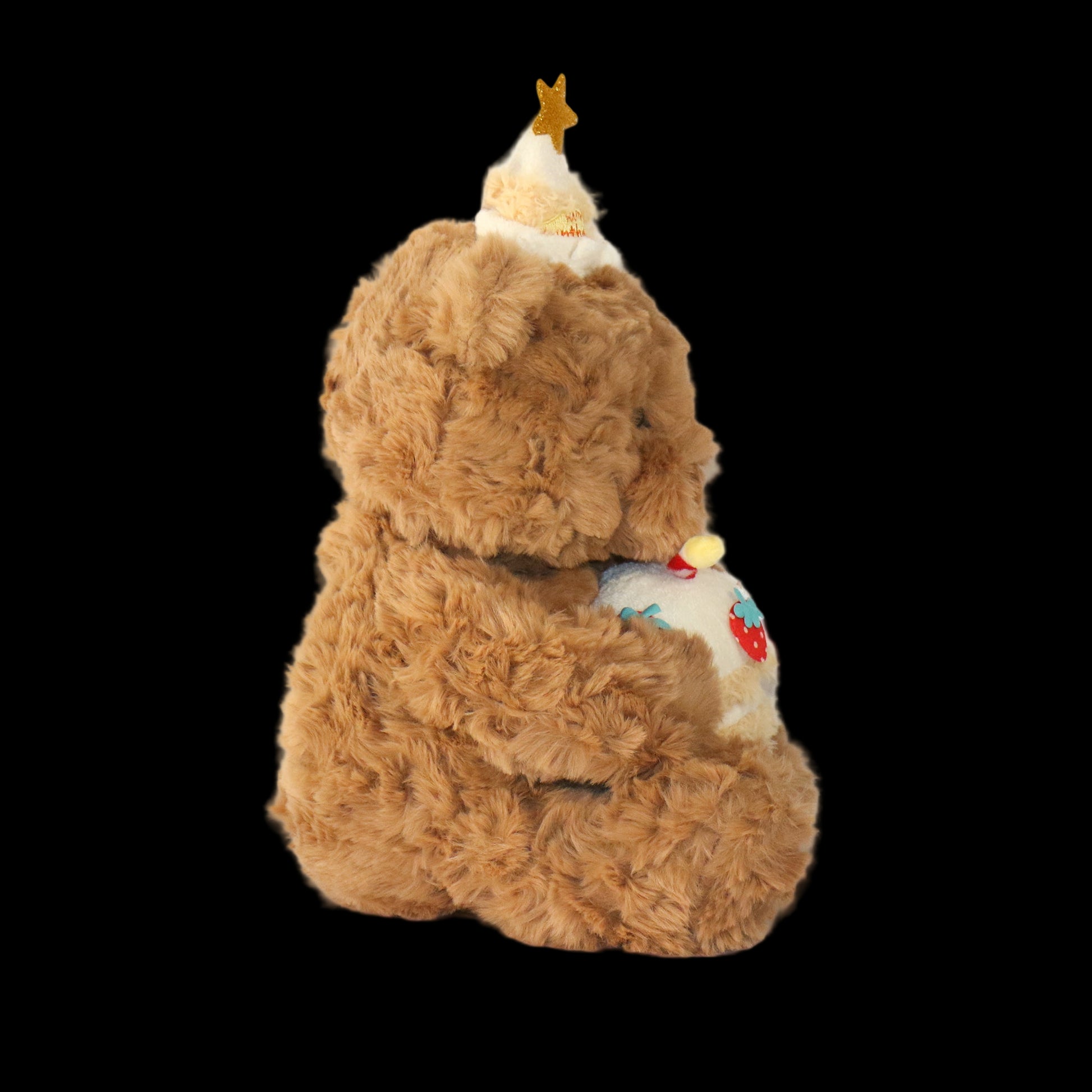 Plush teddy bear shaped like a Christmas tree on a white background