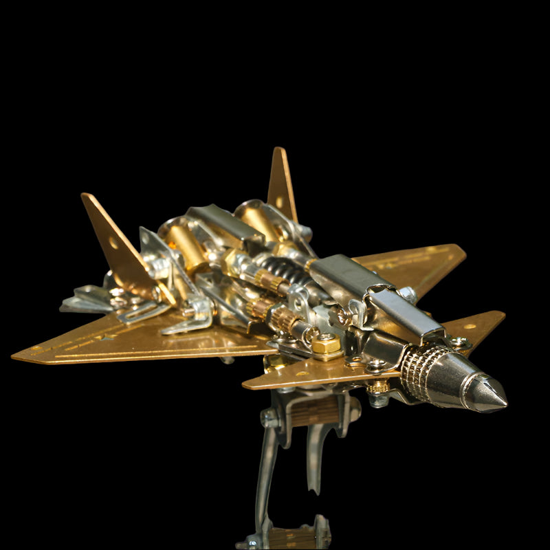 Metallic model of a fighter jet on a reflective surface with a blurred background