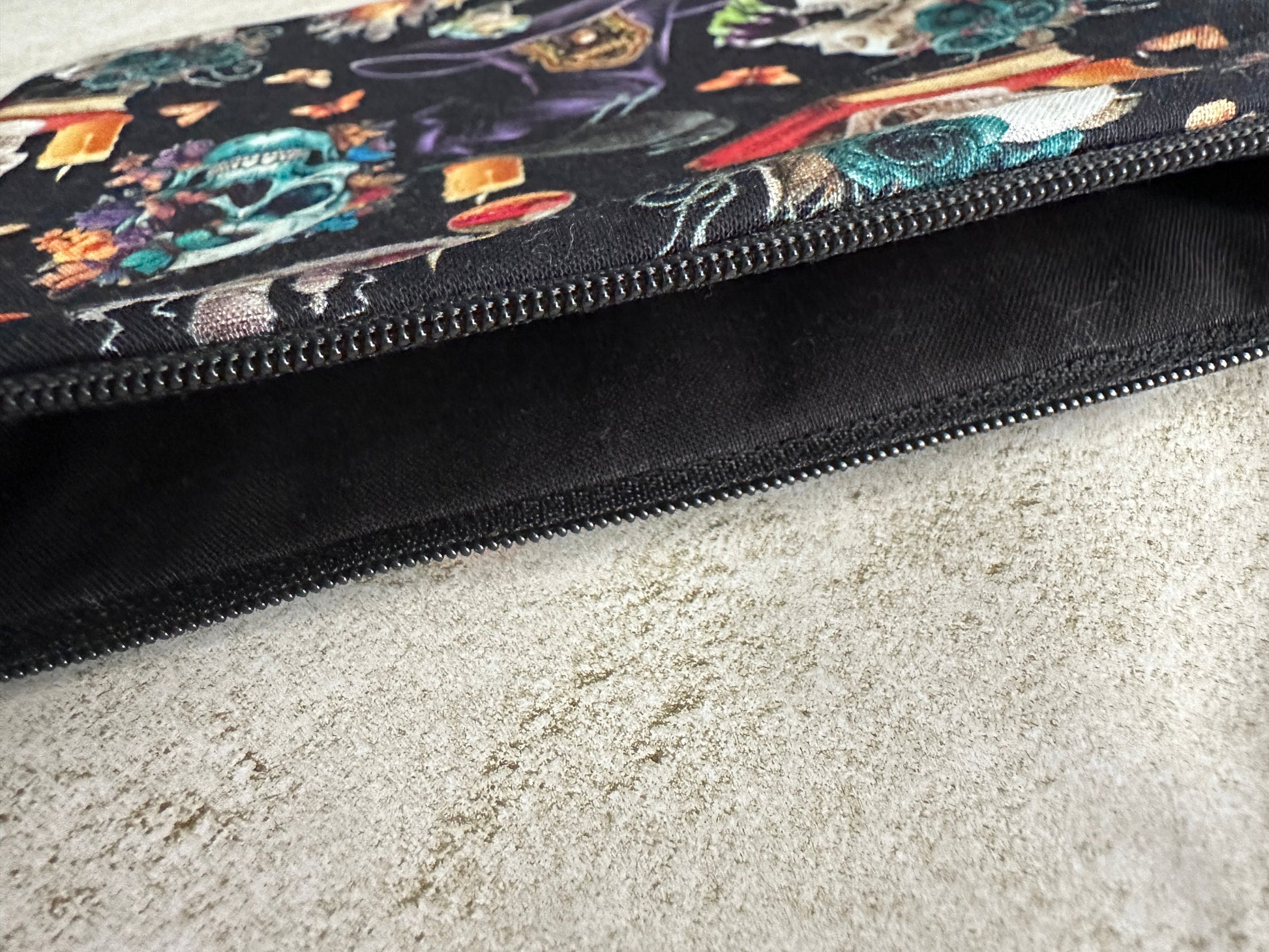 Colorful patterned pouch on a textured surface