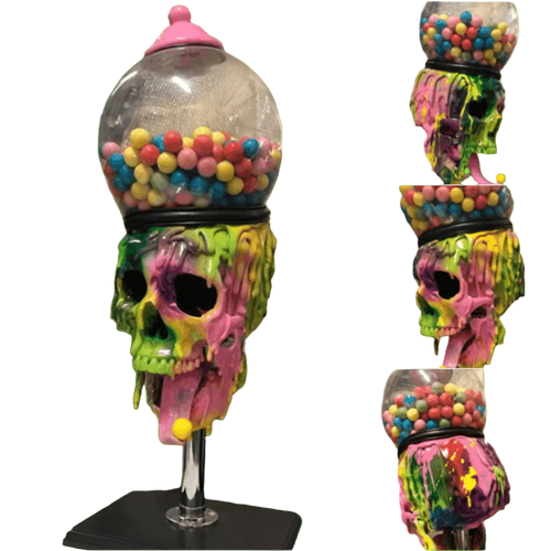Colorful skull-shaped gumball machine with multicolored gumballs on a metallic background.