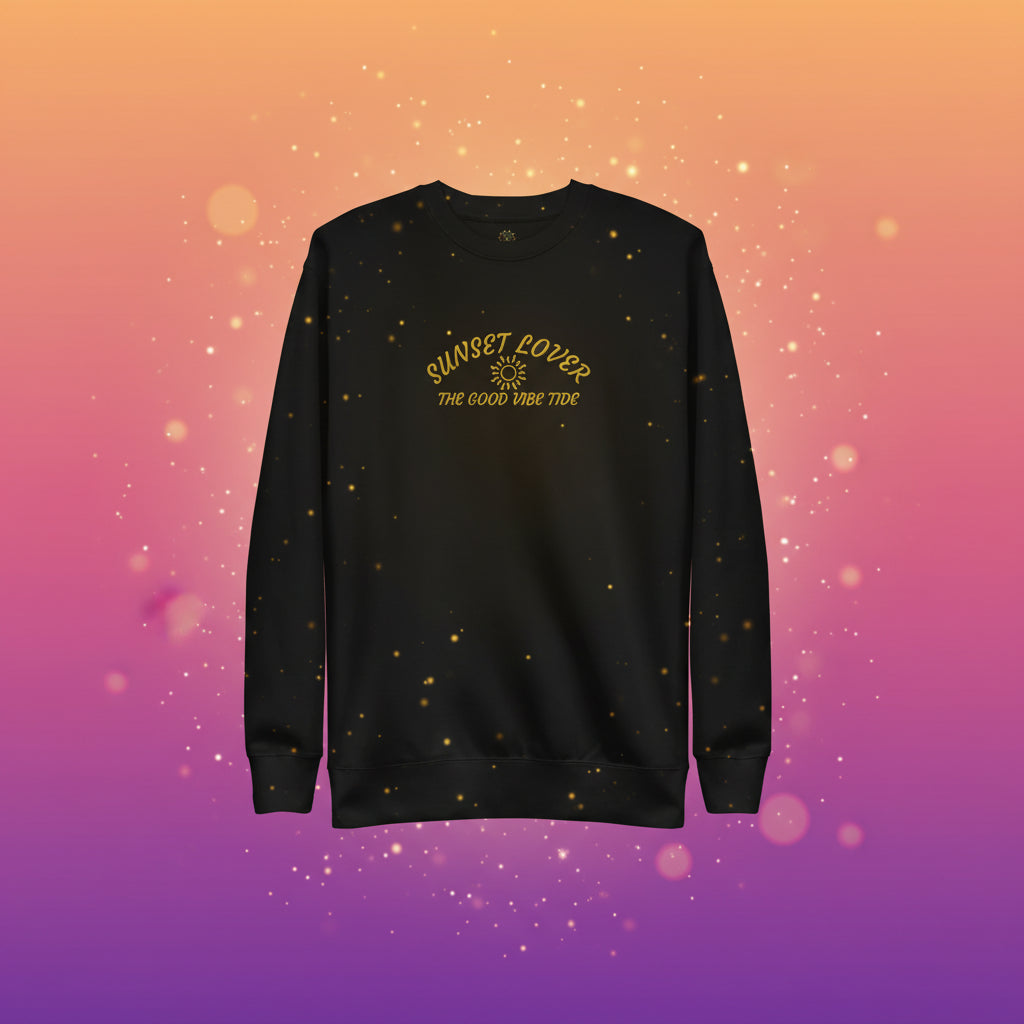 Black sweatshirt with yellow text and sun graphic on a white background