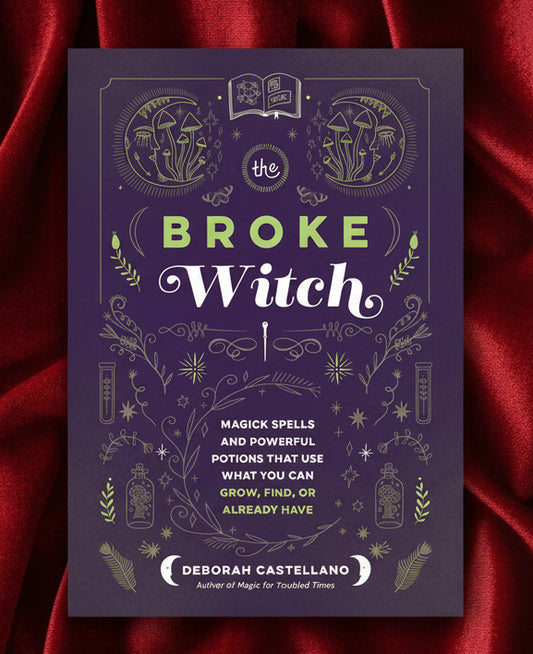 Book cover of 'The Broke Witch' with magickal symbols and text on a purple background