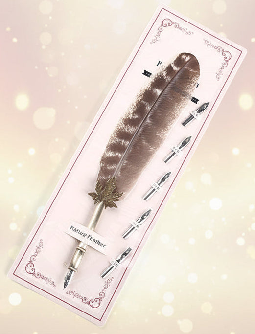 Feather pen on a pink card with branding on a white background