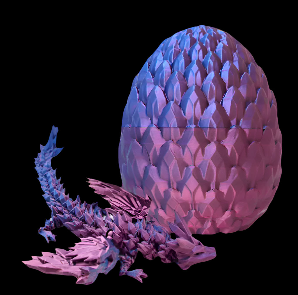 Purple dragon sculpture in front of a matching purple egg on a gray background