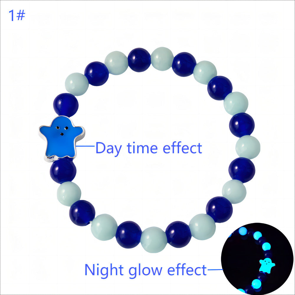 Beaded bracelet with a blue star charm, showing day and night glow effects.