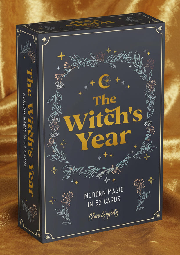 Card deck packaging titled 'The Witch's Year' with decorative elements on a white background