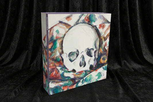 A 3D box mockup of a jigsaw puzzle featuring Edvard Munch's 'The Skull' painting. The box is shown at an angle against a plain white background, displaying the colorful artwork and a purple brand spine.
