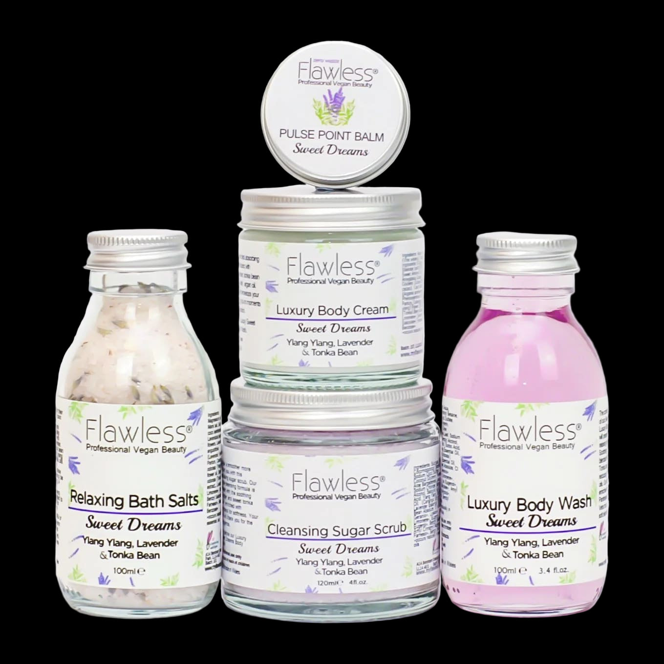 Collection of Flawless beauty products including bath salts, cream, scrub, and body wash on a white background.