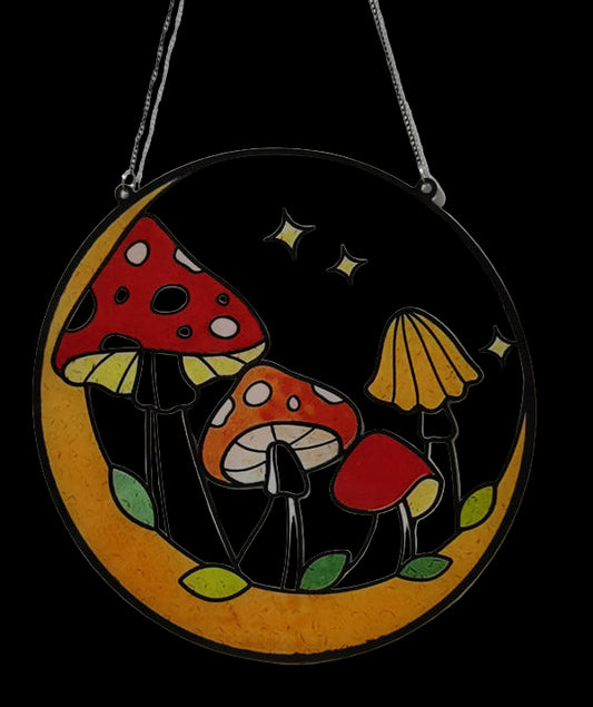 Circular stained glass panel with colorful mushrooms on a white background