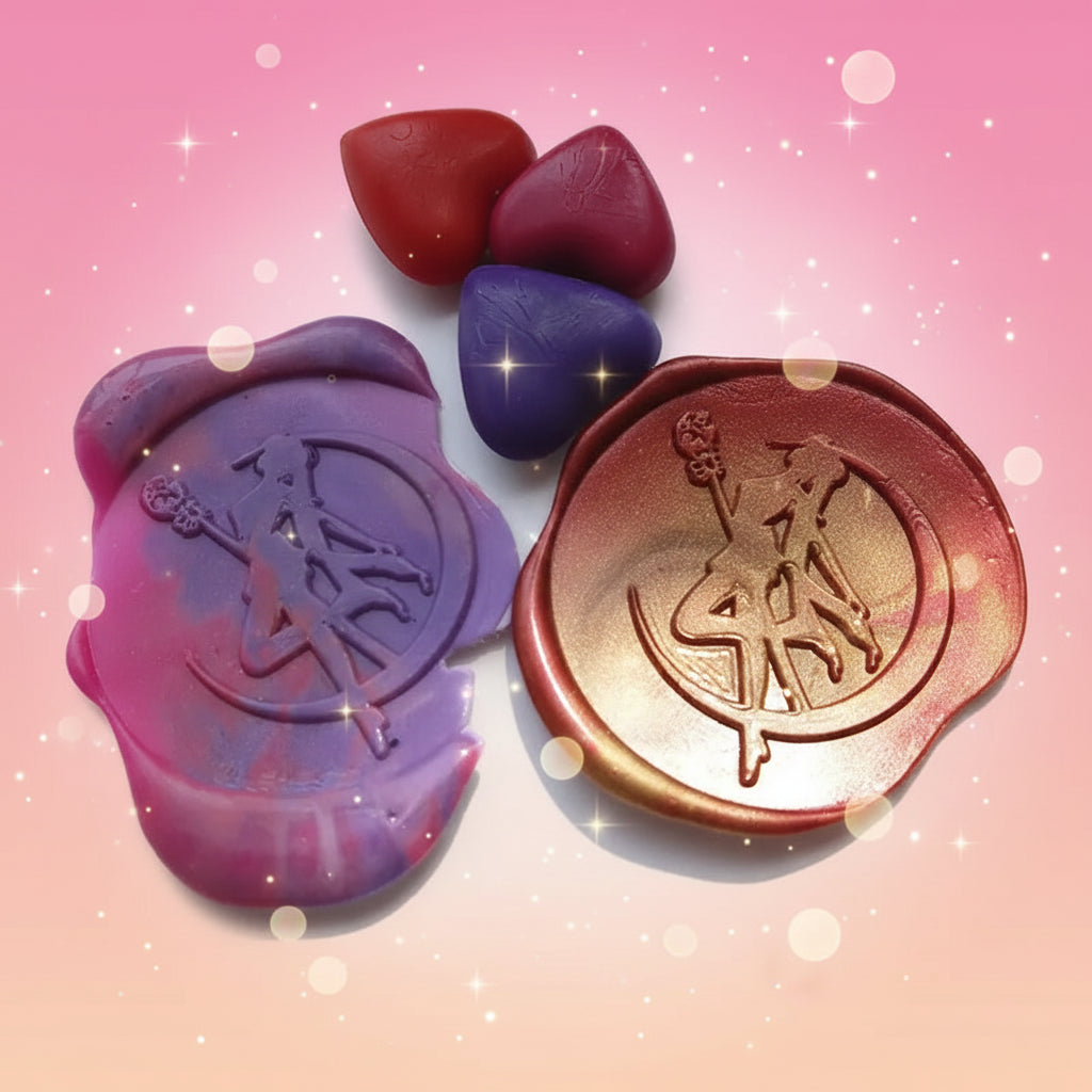 Two wax seals, one purple and one gold, on a white background