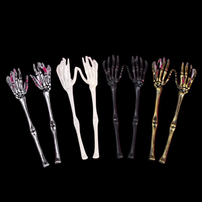 Set of skeleton hand forks in various colors on a white background