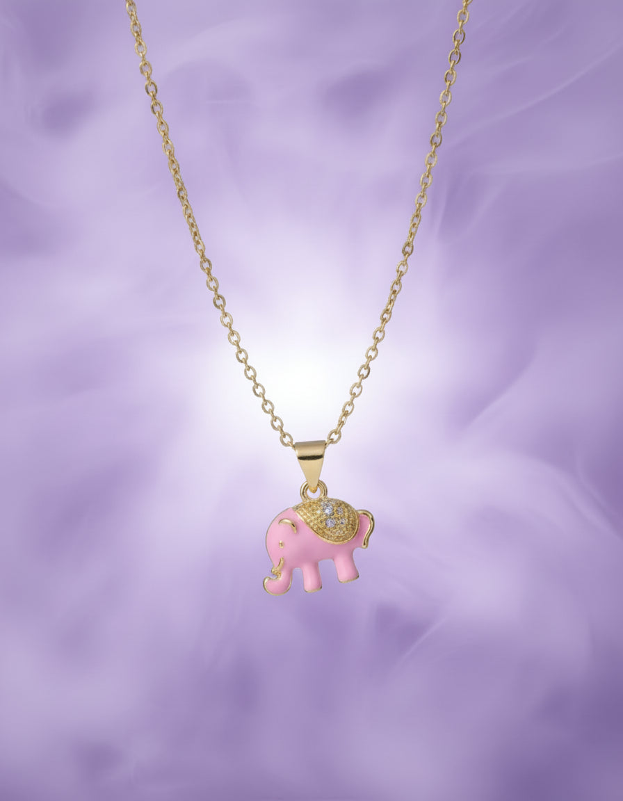 Necklace with a pink elephant pendant on a textured surface