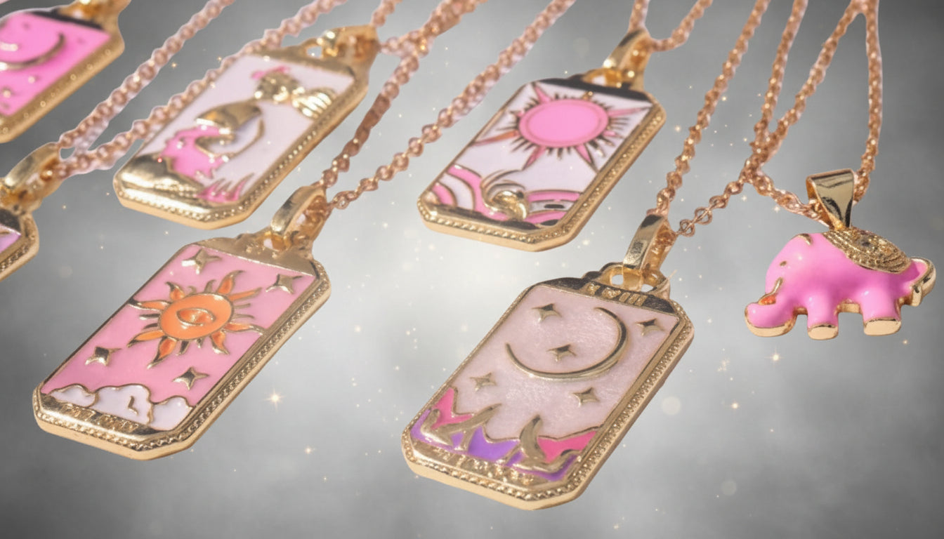 Colorful necklaces with various pendants on a white surface